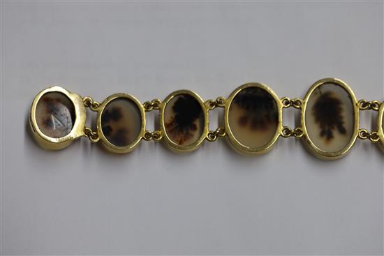 A late Victorian gold and moss agate bracelet, approximately 17cm.